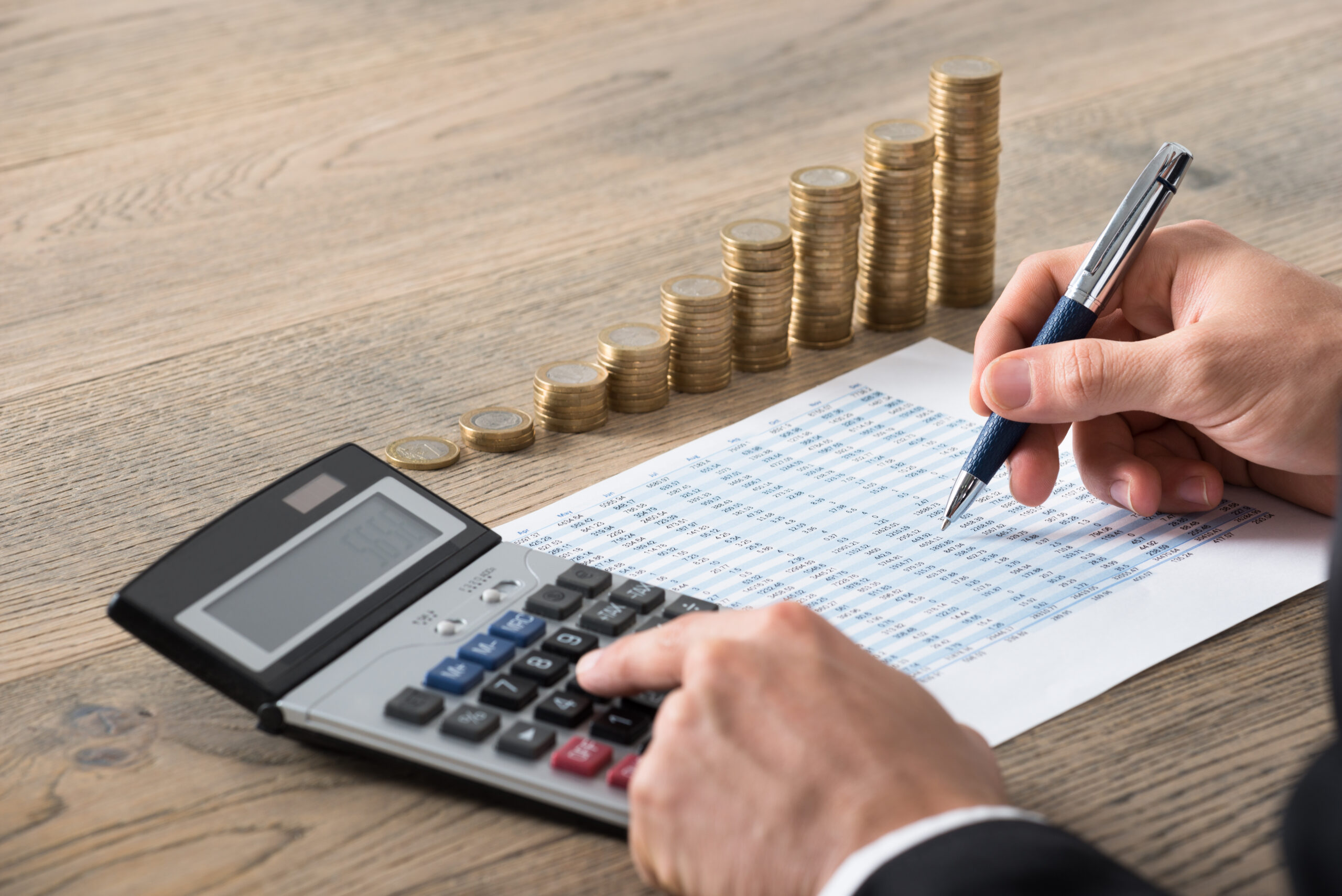 Close-up Of A Businessman Analyzing Financial Report Aircraft Financing